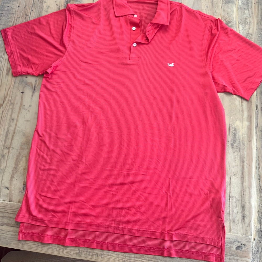 This is a Southern Marsh Dunmore Performance Polo in Strawberry Fizz.